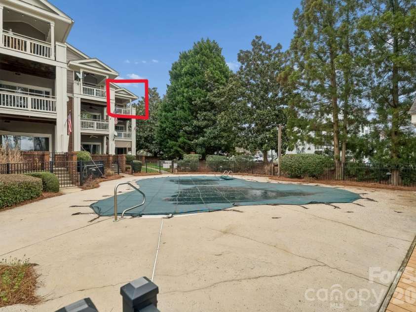 7844 Village Harbor Drive, Cornelius, NC 28031.  MLS# CAR4356496, YatesRealty ID 4288. Community pool w/ unit highlighted