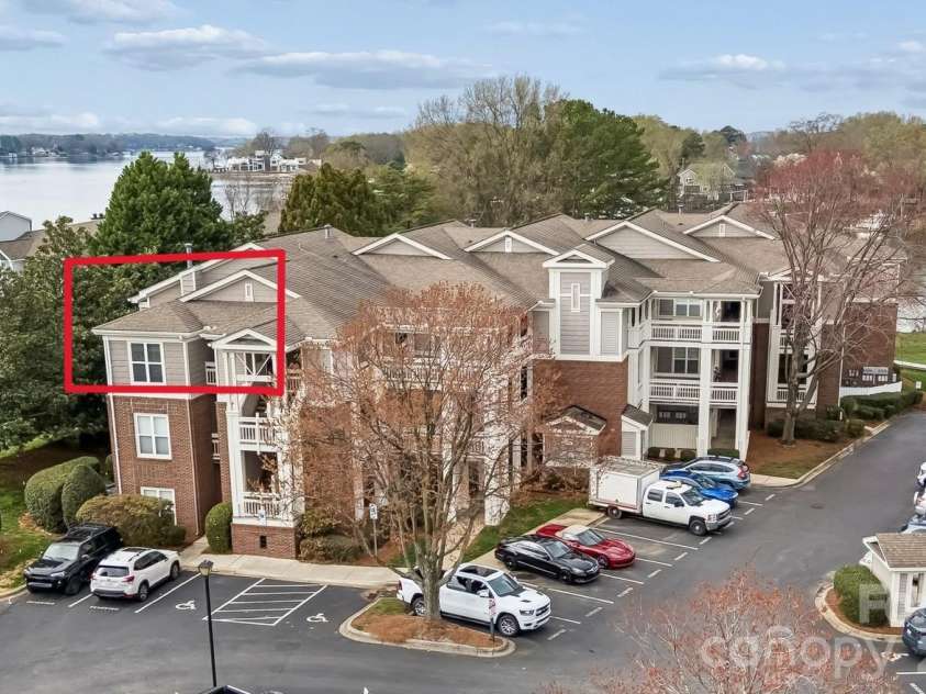 7844 Village Harbor Drive, Cornelius, NC 28031.  MLS# CAR4356496, YatesRealty ID 4288. Penthouse corner unit