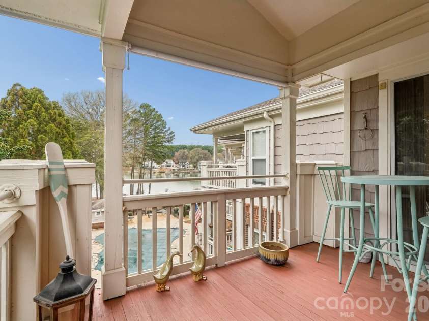 7844 Village Harbor Drive, Cornelius, NC 28031.  MLS# CAR4356496, YatesRealty ID 4288. Water view from the deck
