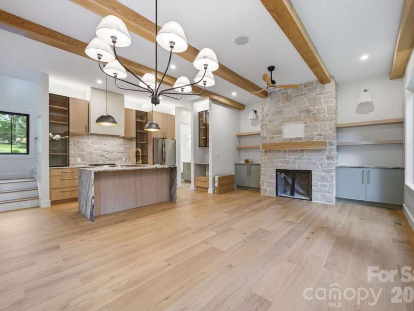 519 Rock Spring Circle, Sugar Mountain, NC 28604.  MLS# CAR4411048, YatesRealty ID 42886. Limestone Surrounds Gas Fireplace