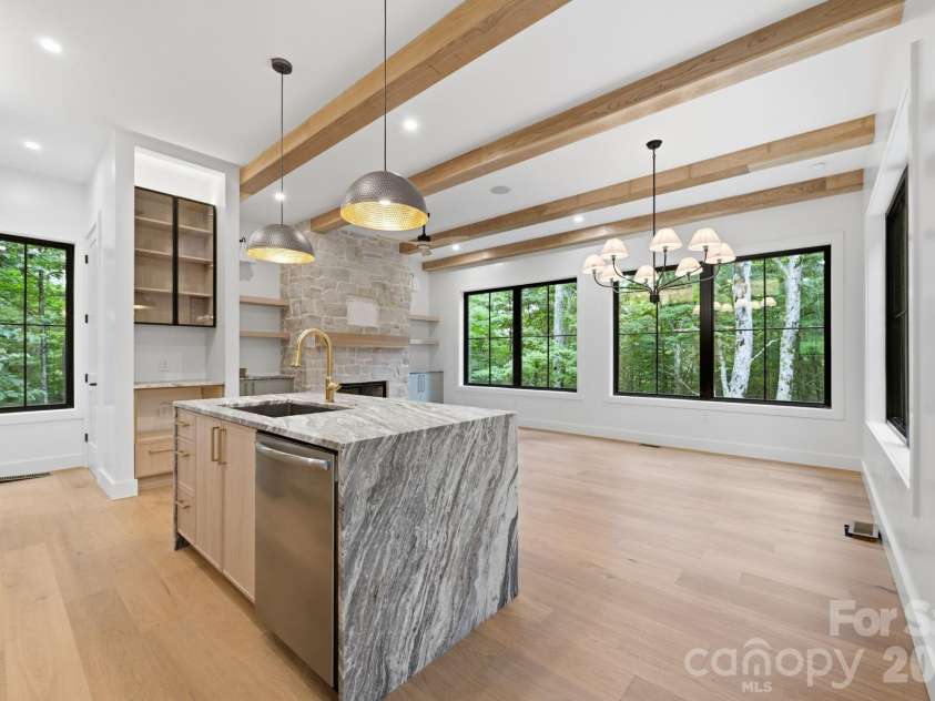 519 Rock Spring Circle, Sugar Mountain, NC 28604.  MLS# CAR4411048, YatesRealty ID 42886. Marble Island w/ Waterfall Edge