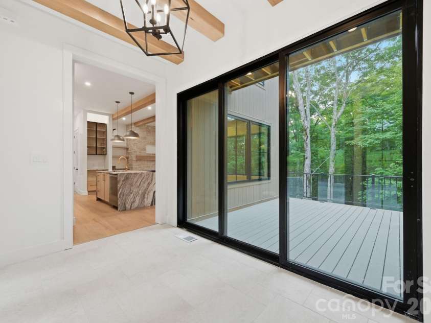 519 Rock Spring Circle, Sugar Mountain, NC 28604.  MLS# CAR4411048, YatesRealty ID 42886. See Through Foyer