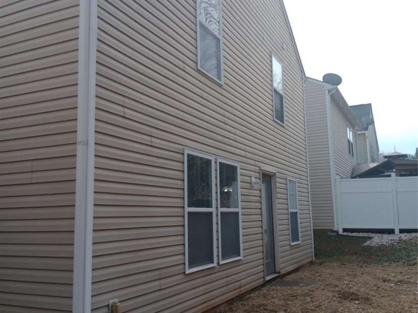 2009 Dunsmore Lane, Waxhaw, NC 28173.  MLS# CAR4288178, YatesRealty ID 4289. Rear of Home