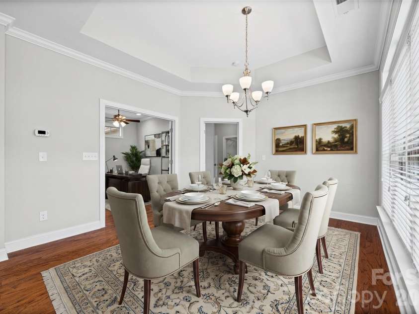1140 Avalon Place, Matthews, NC 28104.  MLS# CAR4407609, YatesRealty ID 42890. Dinning Room virtually staged