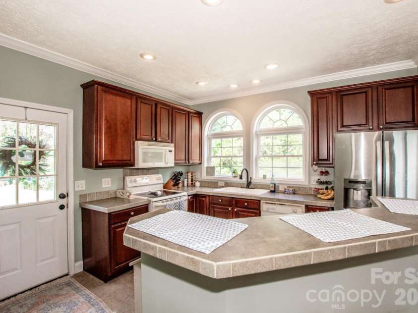 2860 Needmore Road, Woodleaf, NC 27054.  MLS# CAR4393767, YatesRealty ID 42895. 