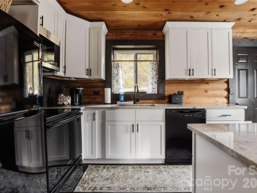 112 Bills Creek Road, Lake Lure, NC 28746.  MLS# CAR4410044, YatesRealty ID 42900. 