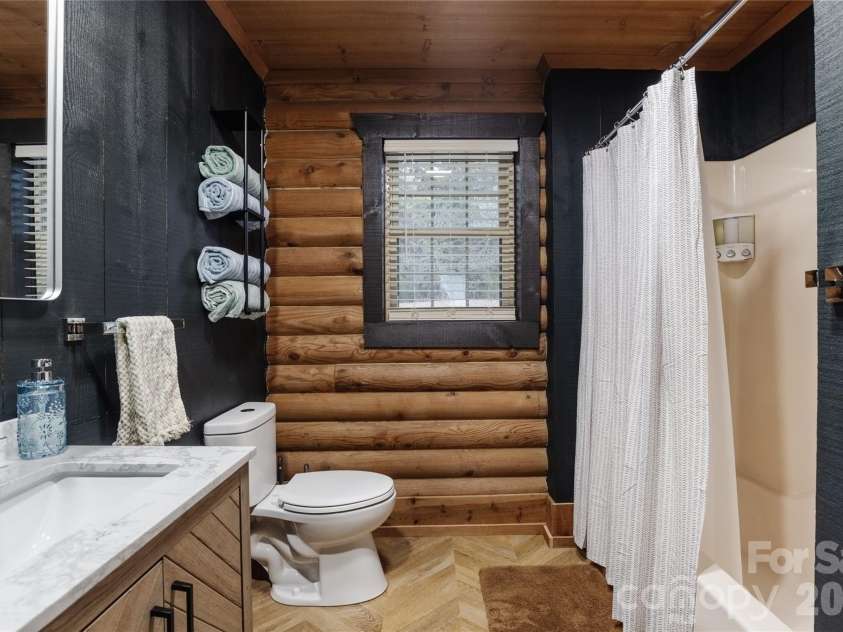 112 Bills Creek Road, Lake Lure, NC 28746.  MLS# CAR4410044, YatesRealty ID 42900. 
