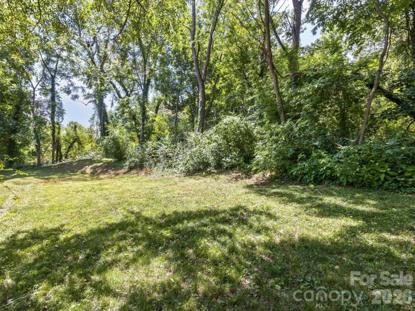 20 Cottage Street, Woodfin, NC 28804.  MLS# CAR4406650, YatesRealty ID 42902. Large backyard
