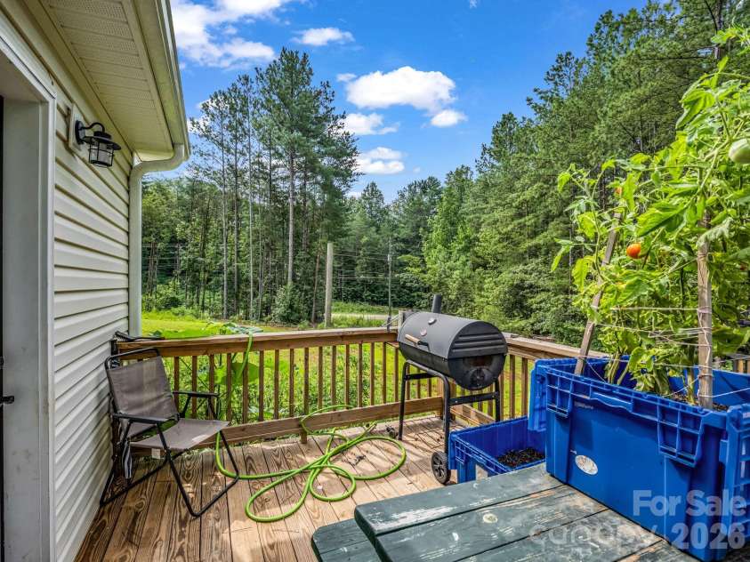 47 Heartleaf Lane, Columbus, NC 28722.  MLS# CAR4408758, YatesRealty ID 42904. Back deck off the kitchen