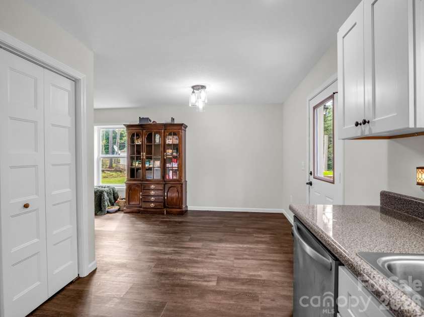 47 Heartleaf Lane, Columbus, NC 28722.  MLS# CAR4408758, YatesRealty ID 42904. Dining Area off kitchen and next to door for back yard/deck