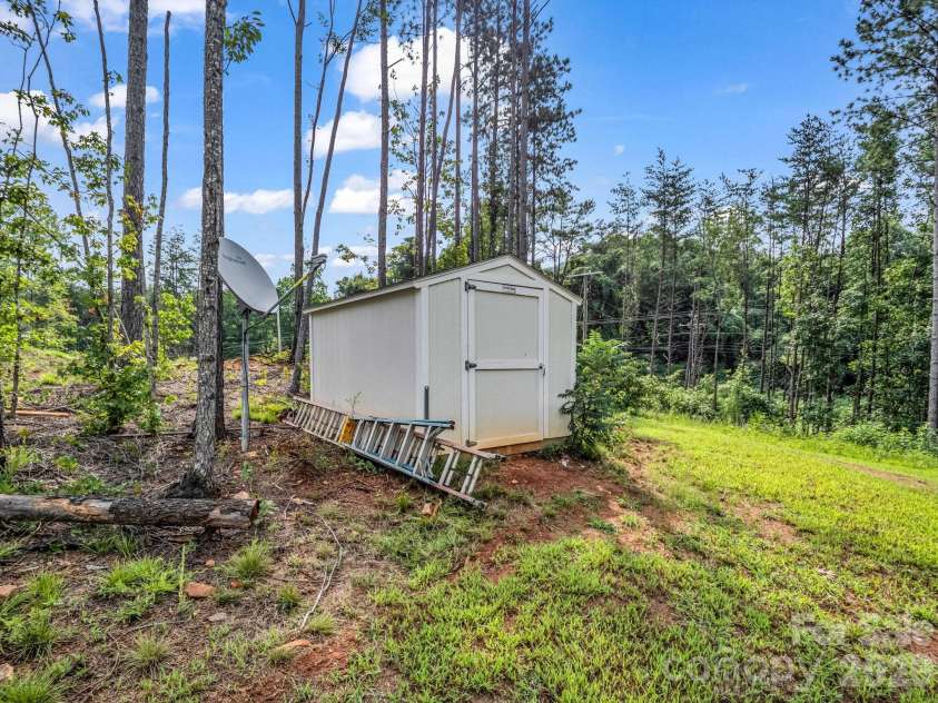 47 Heartleaf Lane, Columbus, NC 28722.  MLS# CAR4408758, YatesRealty ID 42904. Storage building