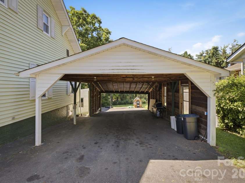 115 Evans Street, Morganton, NC 28655.  MLS# CAR4411941, YatesRealty ID 42908. Covered Carport