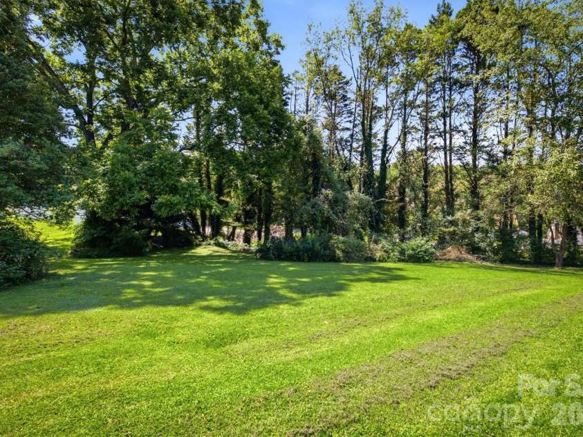 115 Evans Street, Morganton, NC 28655.  MLS# CAR4411941, YatesRealty ID 42908. Private Backyard