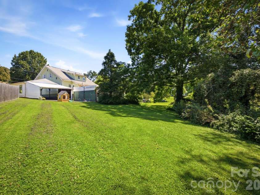 115 Evans Street, Morganton, NC 28655.  MLS# CAR4411941, YatesRealty ID 42908. Private Backyard