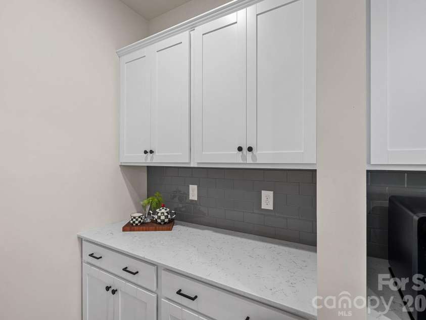 262 Abersham Drive, Mooresville, NC 28115.  MLS# CAR4409392, YatesRealty ID 42916. Butler's pantry off kitchen.