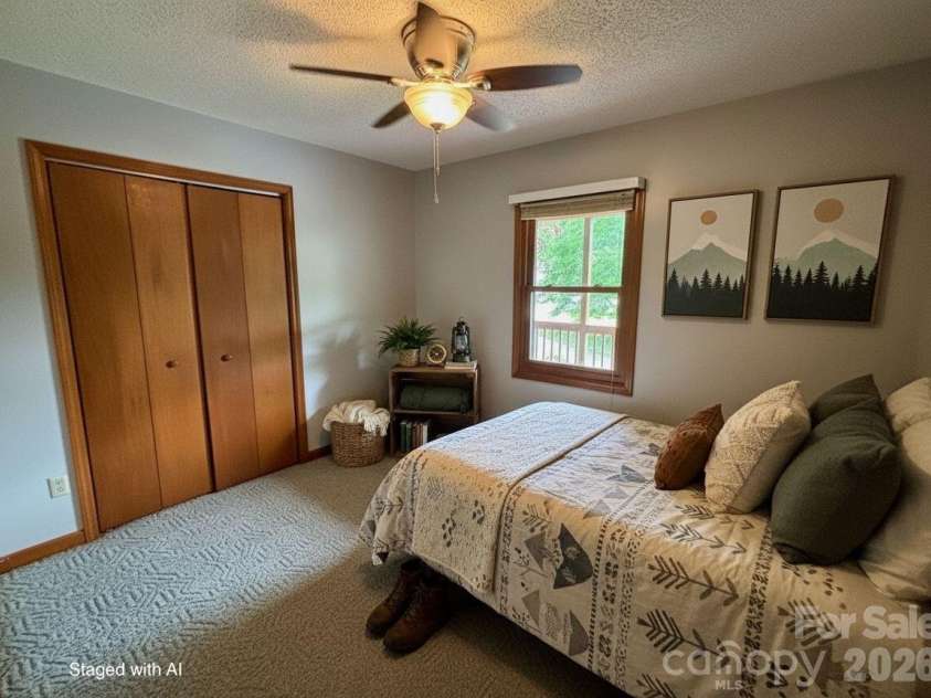 21 Ashwood Drive, Asheville, NC 28803.  MLS# CAR4404647, YatesRealty ID 42917. Bedroom 2 with AI Generated Staging
