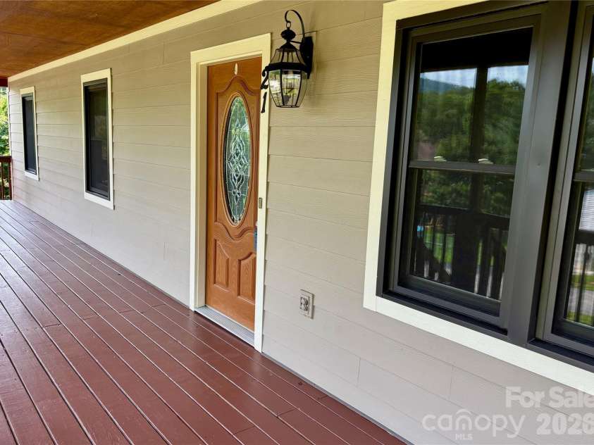 21 Ashwood Drive, Asheville, NC 28803.  MLS# CAR4404647, YatesRealty ID 42917. Front Door from Deck