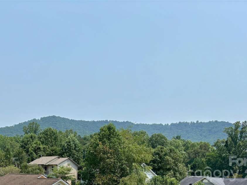 21 Ashwood Drive, Asheville, NC 28803.  MLS# CAR4404647, YatesRealty ID 42917. Mountains from Front Deck