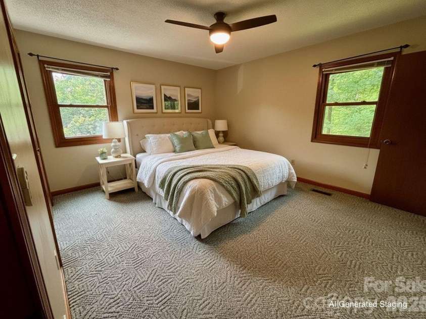 21 Ashwood Drive, Asheville, NC 28803.  MLS# CAR4404647, YatesRealty ID 42917. Primary Bedroom with AI Generated Staging