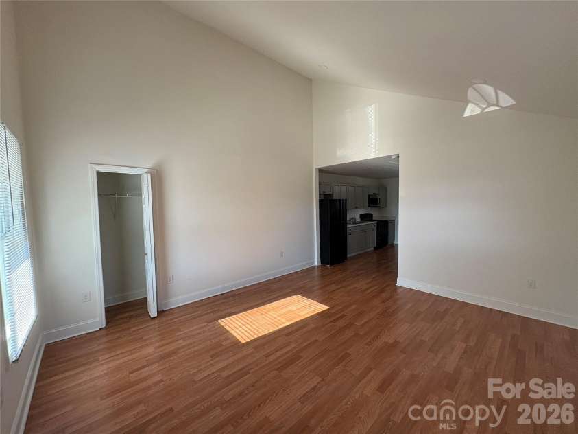 218 Odell Drive, Concord, NC 28025.  MLS# CAR4413079, YatesRealty ID 42925. Living Room with Vaulted Ceiling