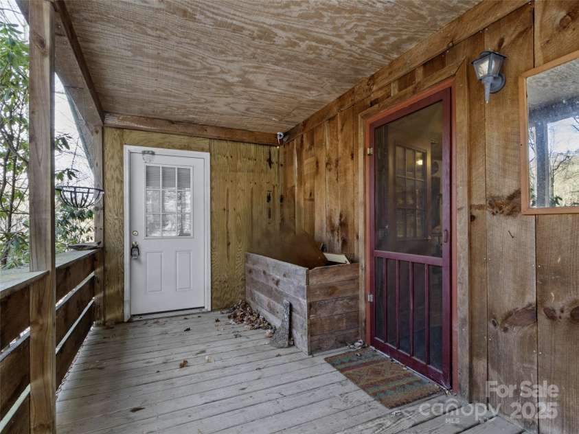 1571 Roaring Fork Road, Burnsville, NC 28714.  MLS# CAR4309867, YatesRealty ID 4293. Front door