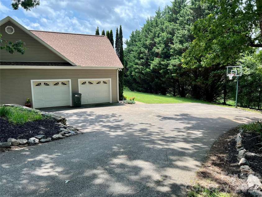 1082 Main Street, Mars Hill, NC 28754.  MLS# CAR4406636, YatesRealty ID 42931. Ample parking and play space