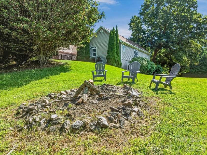 1082 Main Street, Mars Hill, NC 28754.  MLS# CAR4406636, YatesRealty ID 42931. Enjoy the cozy firepit on a cool fall evening
