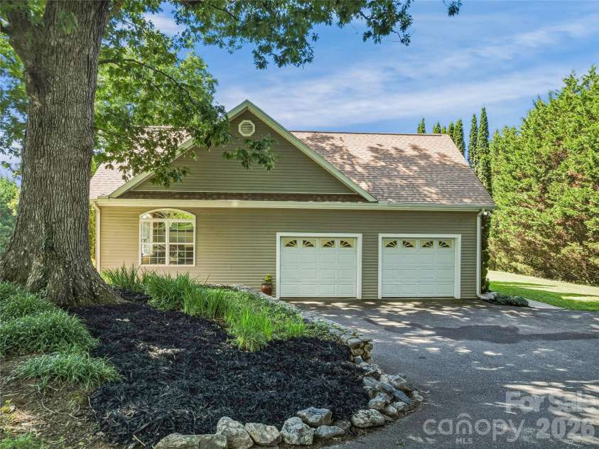 1082 Main Street, Mars Hill, NC 28754.  MLS# CAR4406636, YatesRealty ID 42931. Oversized double garage walks into mudroom