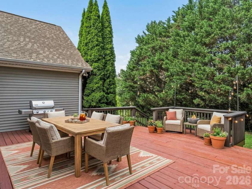 1082 Main Street, Mars Hill, NC 28754.  MLS# CAR4406636, YatesRealty ID 42931. Virtually Staged spacious deck, ready for quiet evenings or big parties