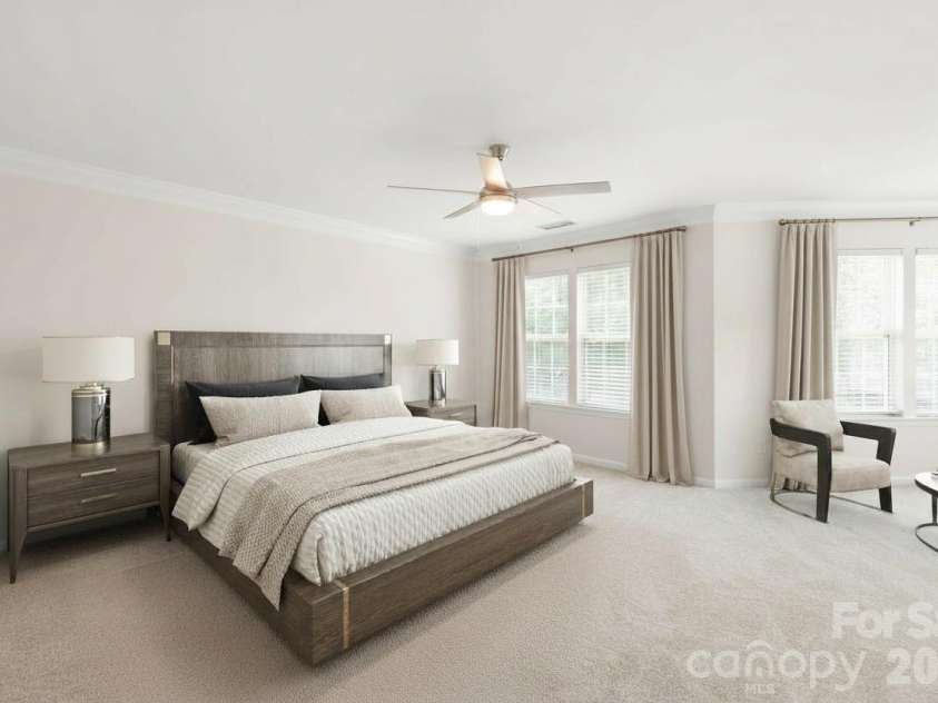 12319 Silveroak Lane, Charlotte, NC 28277.  MLS# CAR4408722, YatesRealty ID 42934. The oversized primary suite offers a spacious, private sanctuary designed for ultimate relaxation, complete with ample room for a sitting area. Virtual Staging