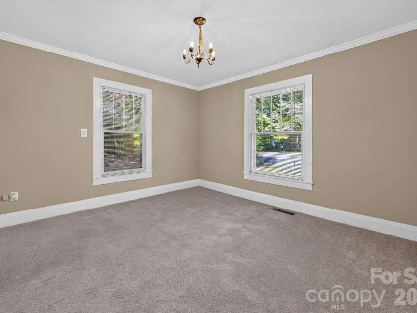 103 West Street, Monroe, NC 28112.  MLS# CAR4413048, YatesRealty ID 42938. Dining Room/ Flex Space