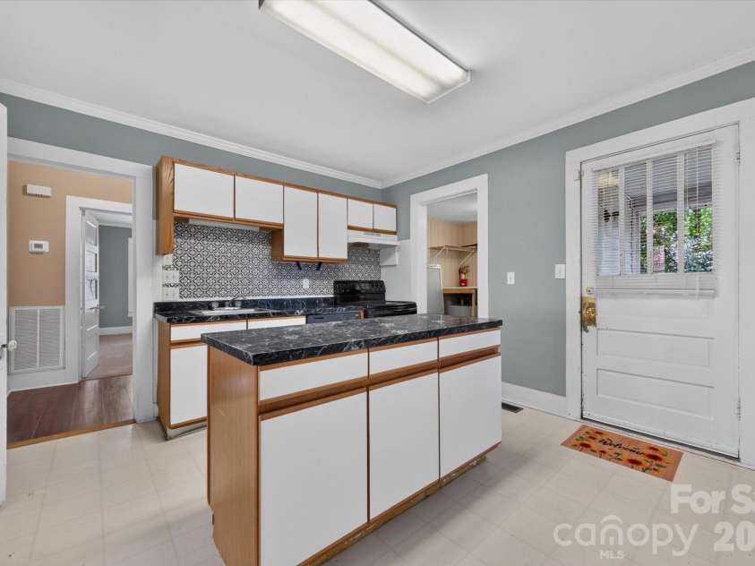 103 West Street, Monroe, NC 28112.  MLS# CAR4413048, YatesRealty ID 42938. Kitchen