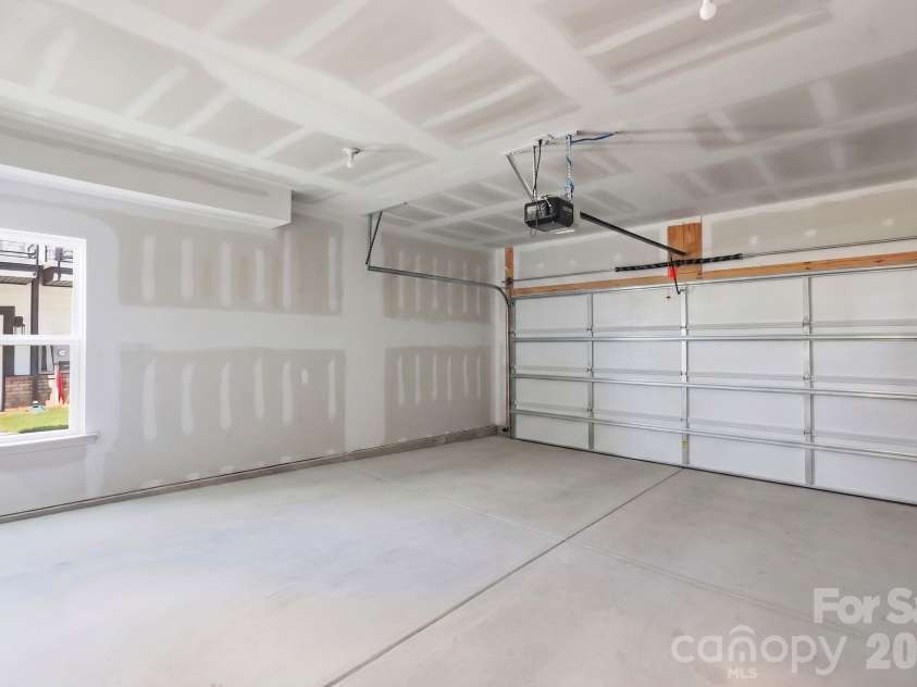 215 Tamala Street, Davidson, NC 28036.  MLS# CAR4409958, YatesRealty ID 42941. 