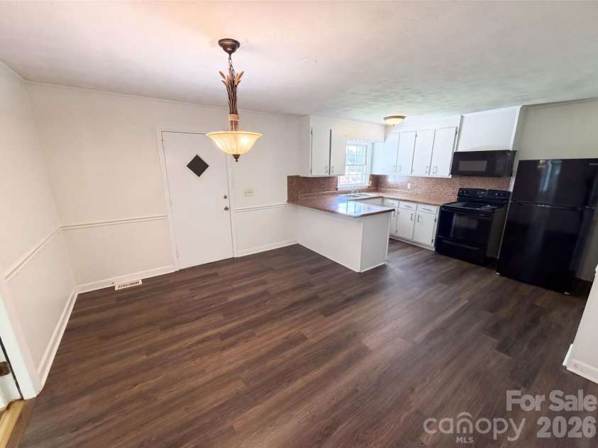 5100 Robinwood Drive, Charlotte, NC 28215.  MLS# CAR4413281, YatesRealty ID 42942. Staged Photo
