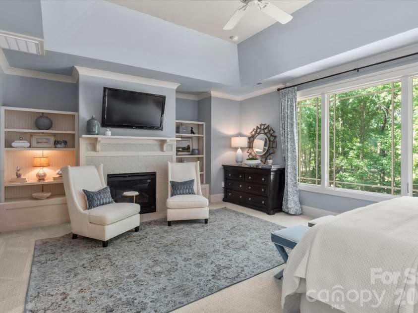1122 Dobson Drive, Waxhaw, NC 28173.  MLS# CAR4406778, YatesRealty ID 42947. ...and an intimate fireplace surrounded by built-ins.