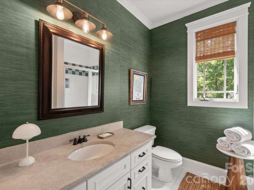 1122 Dobson Drive, Waxhaw, NC 28173.  MLS# CAR4406778, YatesRealty ID 42947. Beautifully maintained full baths featuring timeless tile selections and premium hardware.