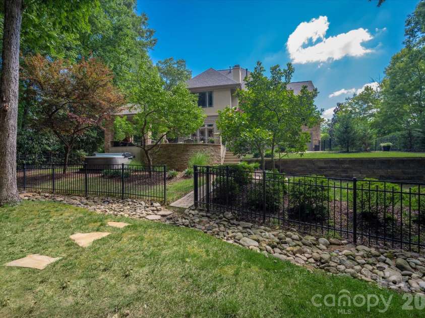 1122 Dobson Drive, Waxhaw, NC 28173.  MLS# CAR4406778, YatesRealty ID 42947. Fenced backyard area with diverse yard usage areas for entertaining flexibility.