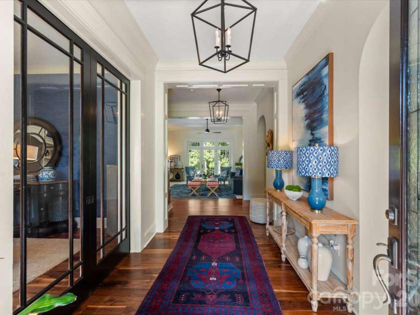 1122 Dobson Drive, Waxhaw, NC 28173.  MLS# CAR4406778, YatesRealty ID 42947. Welcome guests into an atmosphere of refinement, featuring sweeping arched, sun-lit entry...