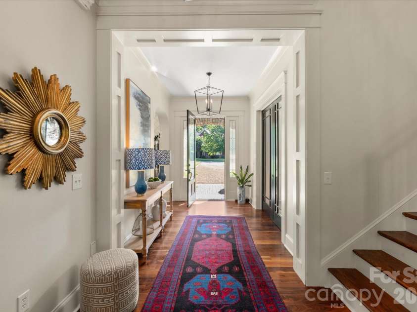 1122 Dobson Drive, Waxhaw, NC 28173.  MLS# CAR4406778, YatesRealty ID 42947. ...with stunning, pristine, wide-plank walnut floors throughout the main level.