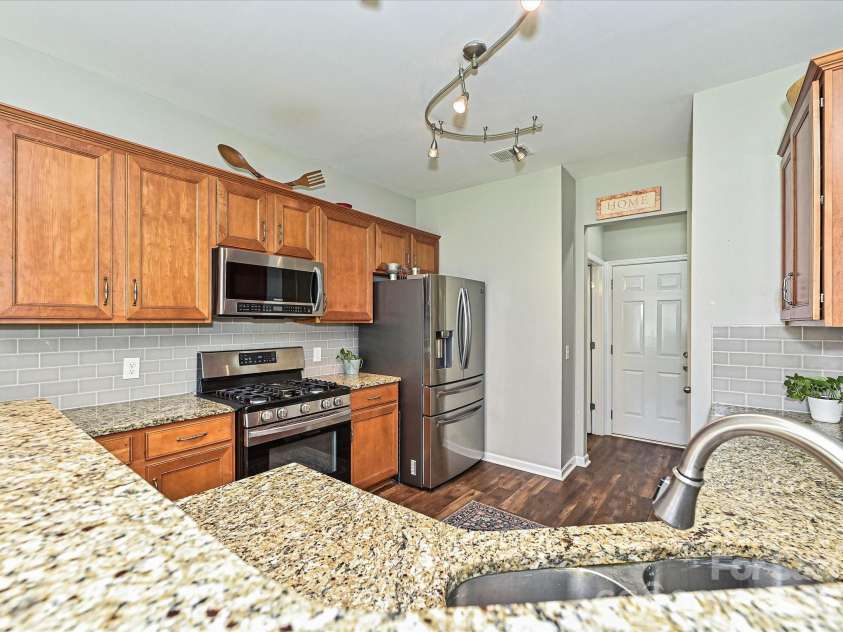2505 Mullis Lane, Matthews, NC 28105.  MLS# CAR4405649, YatesRealty ID 42957. 