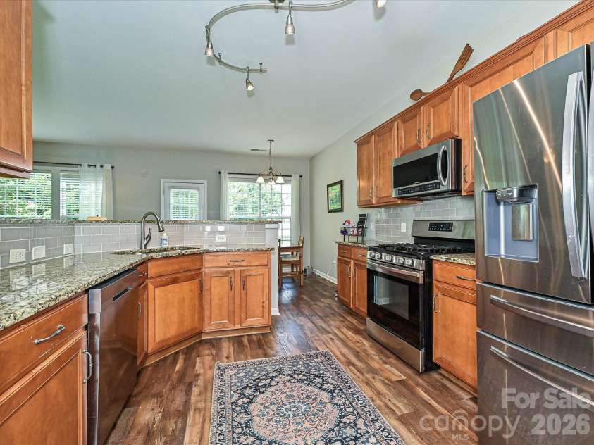 2505 Mullis Lane, Matthews, NC 28105.  MLS# CAR4405649, YatesRealty ID 42957. 