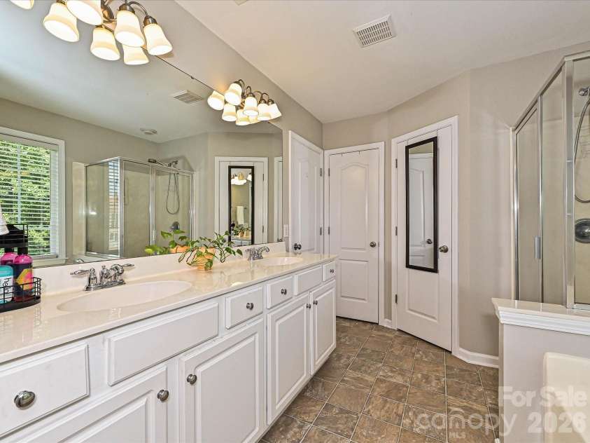2505 Mullis Lane, Matthews, NC 28105.  MLS# CAR4405649, YatesRealty ID 42957. 