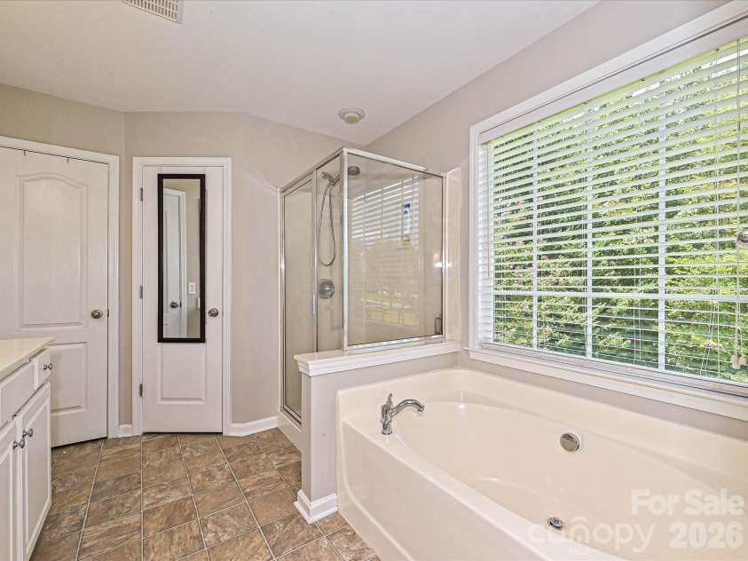 2505 Mullis Lane, Matthews, NC 28105.  MLS# CAR4405649, YatesRealty ID 42957. 