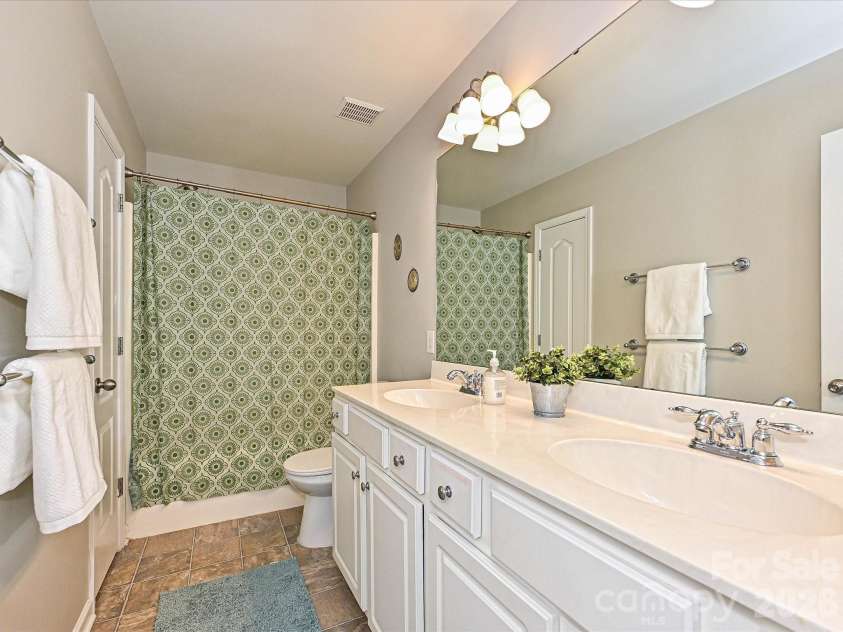 2505 Mullis Lane, Matthews, NC 28105.  MLS# CAR4405649, YatesRealty ID 42957. 
