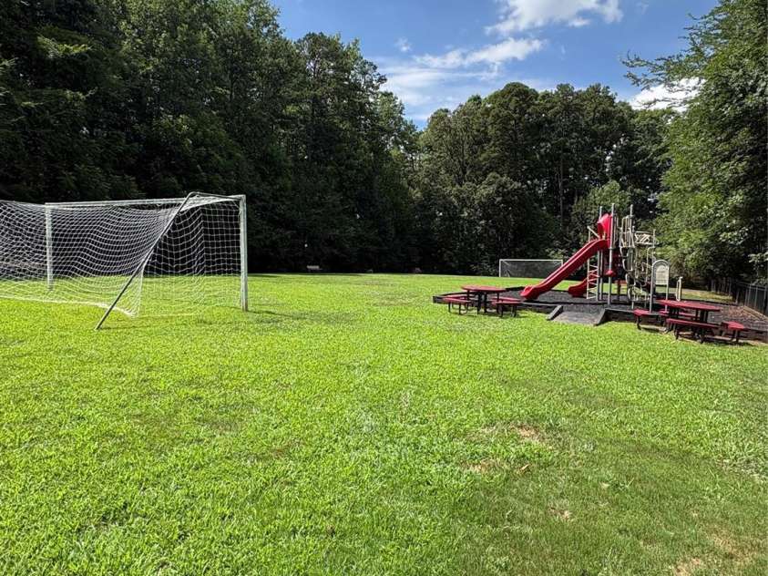 2505 Mullis Lane, Matthews, NC 28105.  MLS# CAR4405649, YatesRealty ID 42957. 