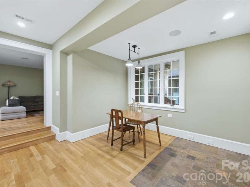 9601 Belt Road, Midland, NC 28107.  MLS# CAR4412563, YatesRealty ID 42969. Breakfast Nook. Steps up to Great Room.