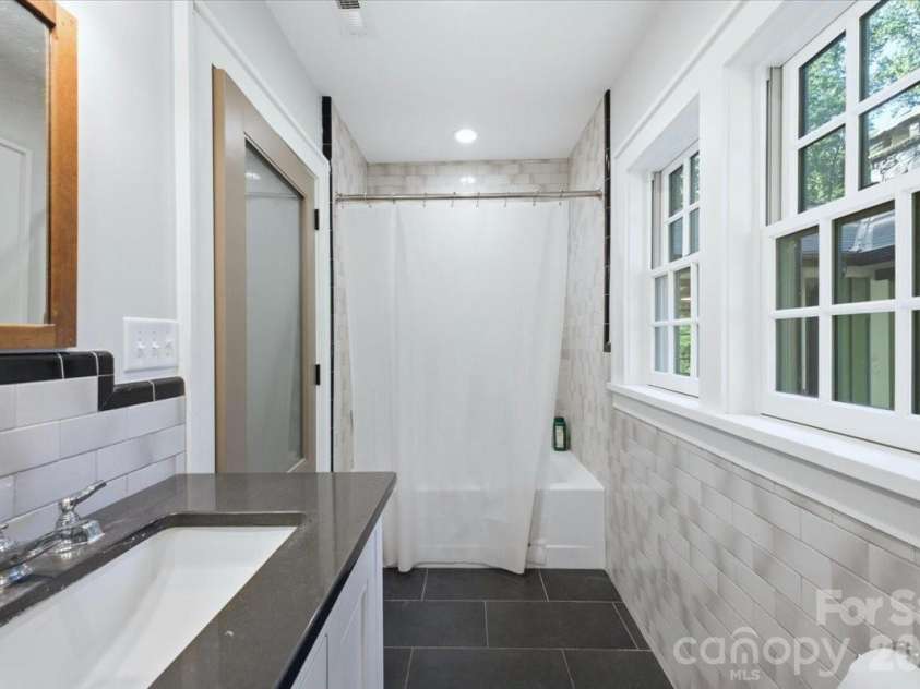 9601 Belt Road, Midland, NC 28107.  MLS# CAR4412563, YatesRealty ID 42969. Guest en suite bath