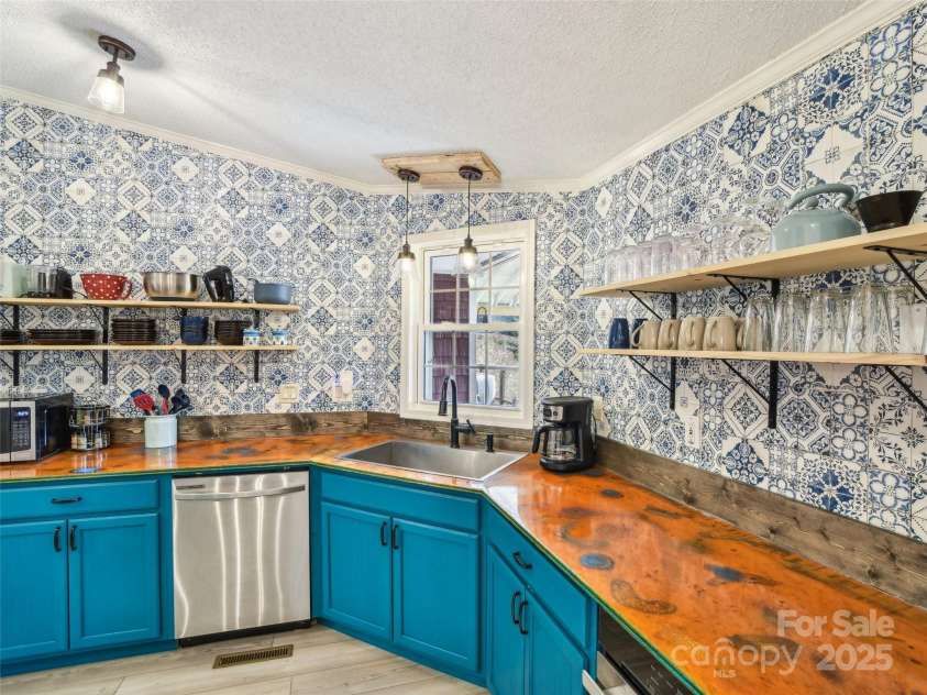 52 Westwind Drive, Canton, NC 28716.  MLS# CAR4238997, YatesRealty ID 4297. 