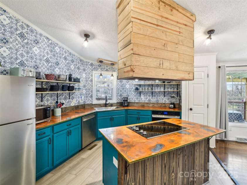 52 Westwind Drive, Canton, NC 28716.  MLS# CAR4238997, YatesRealty ID 4297. 