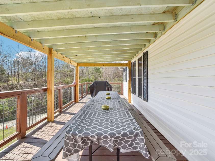 52 Westwind Drive, Canton, NC 28716.  MLS# CAR4238997, YatesRealty ID 4297. Salt water hot tub